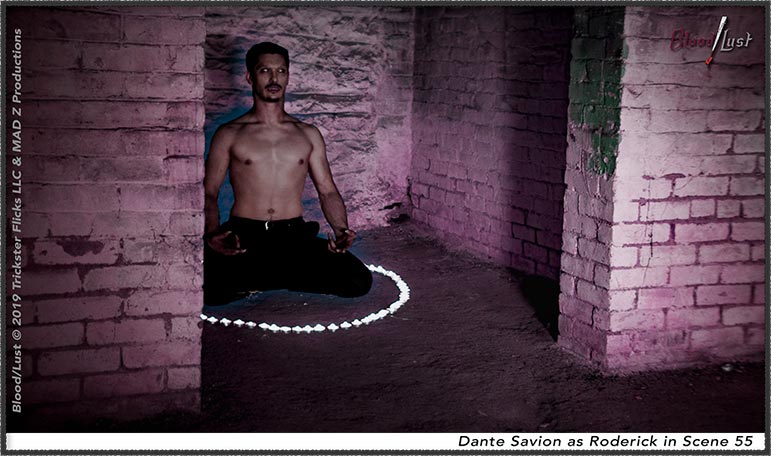 vampire sits in lotus position in his lair .